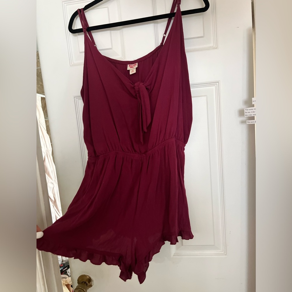 Fairly new.. only worn one time. Burgundy darker in person.